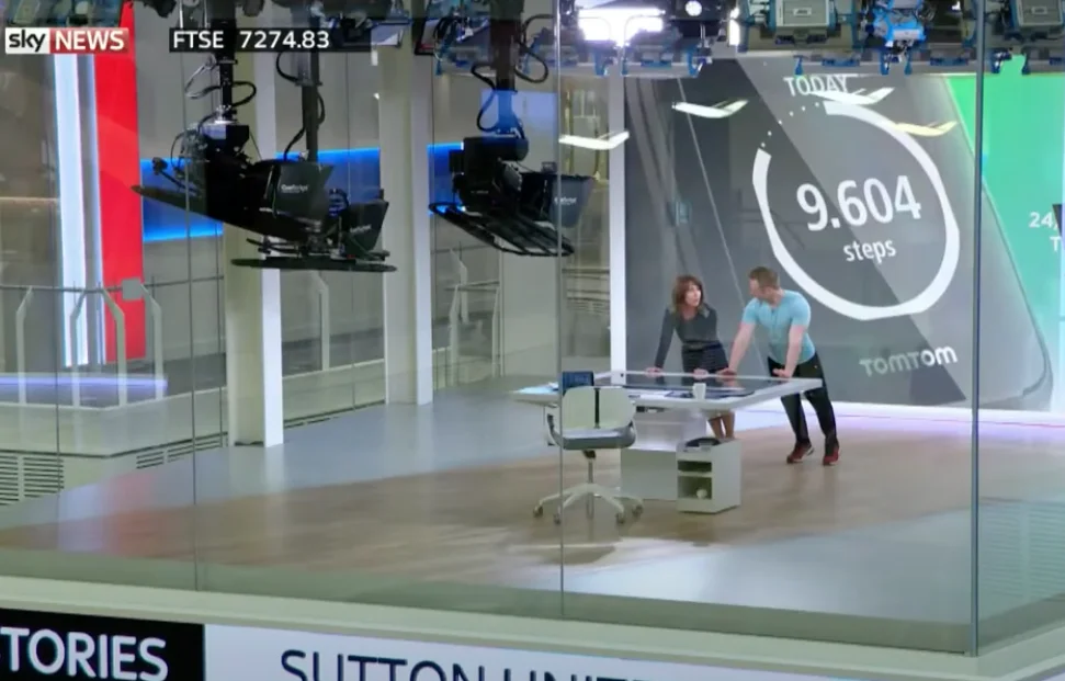 Fitness coach Scott Laidler doing exercise live on TV with Sky News presenter Kay Burley