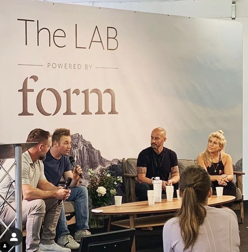 Personal trainer Scott Laidler speaking as part of panel at balance festival in London, UK