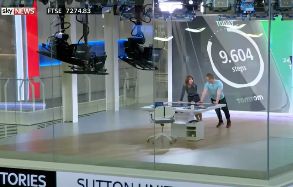 Personal trainer Scott Laidler in sky studio with Kay Burley doing press-ups on live television