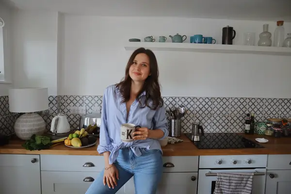 Nutritionist Dr. Katie Turianytsia standing in kitchen