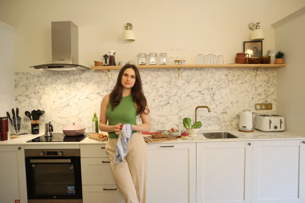 Nutritionist Dr Katie Turianytsia standing in kitchen