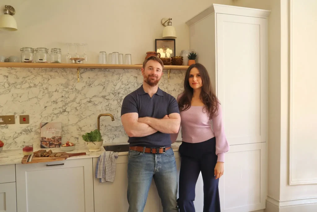 personal trainer Scott Laidler in kitchen with Nutritionist Kate Turianytsia